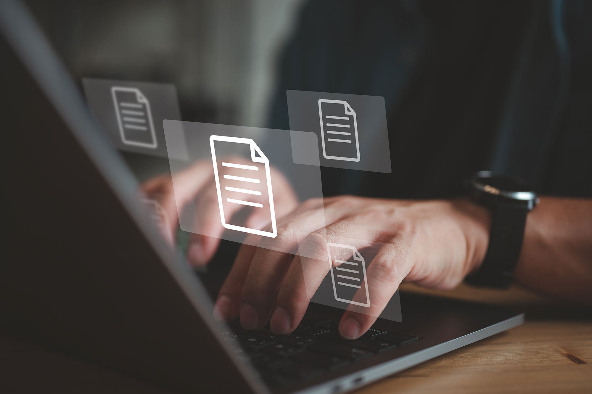 Person working on laptop suggesting accessing data